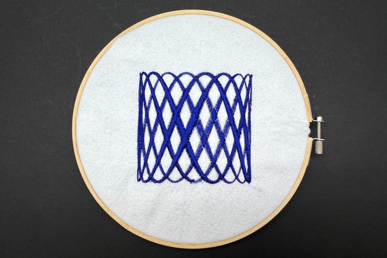blue lissajous pattern with embroidery 